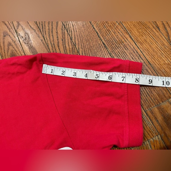 AKKO EMPIRE
Stylish Red Polo Shirt with Fox Design - Picture 6 of 10